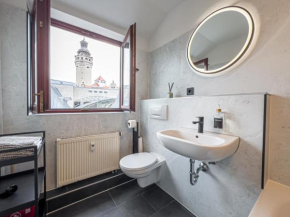 Rathausblick – Moderne Ferienwohnung mit 2 Schlafzimmern, Küche, Bad, Waschmaschine & Trockner mitten in der Innenstadt